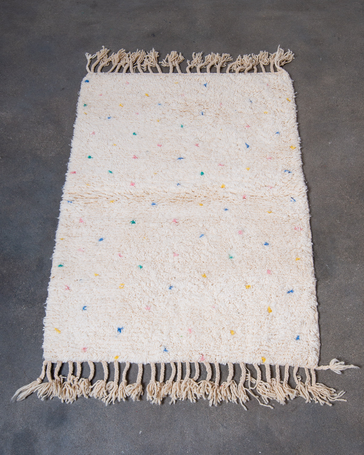 Modern, designer, handcrafted Berber rug from Morocco. Beniourain carpet with beautiful colours and patterns and fluffy wool texture.